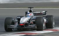Raikkonen of Finland and McLaren in action