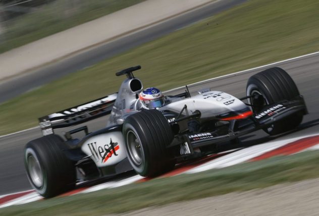 Raikkonen of Finland and McLaren in action