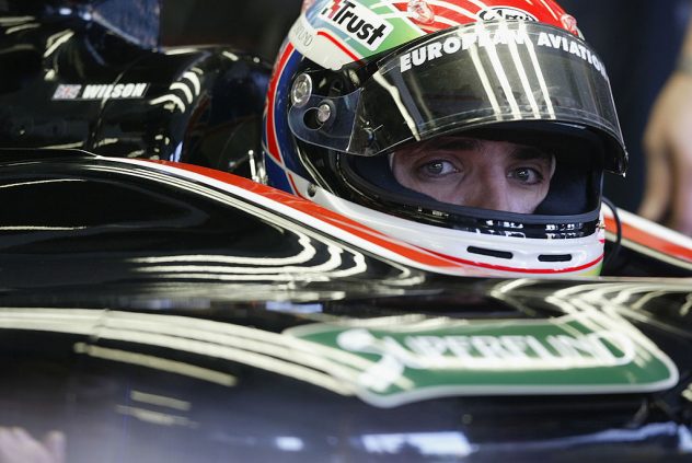 Justin Wilson of Great Britain and the Minardi Racing Team sits in his car